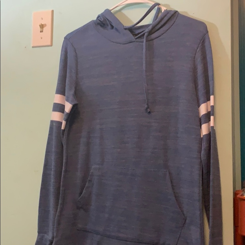 Blue sweatshirt with white varsity stripes